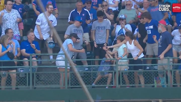 A young fan caught a foul ball with his hat, saving another kid from getting hit. 