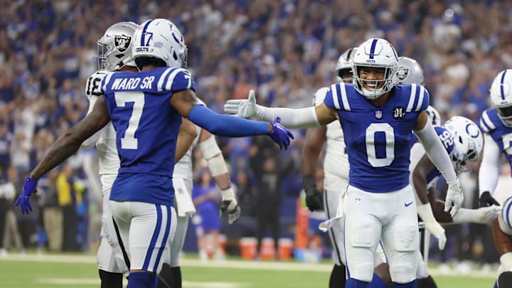 Oct 5, 2025; Indianapolis, Indiana, USA; Indianapolis Colts safety Cam Bynum (0) high fives cornerback Charvarius Ward (7) after an interception against the Las Vegas Raiders during the second quarter at Lucas Oil Stadium. 