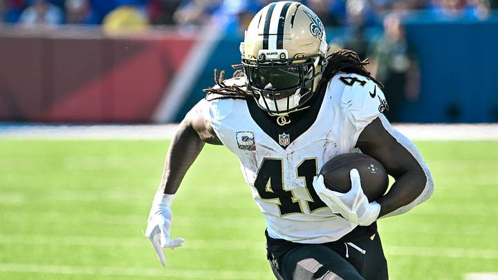 Sep 28, 2025; Orchard Park, New York, USA; New Orleans Saints running back Alvin Kamara (41) carries the ball against the Buffalo Bills in the third quarter at Highmark Stadium. Mandatory Credit: Mark Konezny-Imagn Images