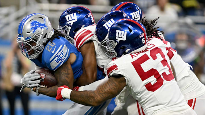 Detroit, Michigan, USA;  Detroit Lions running back Jahmyr Gibbs (26) gets tackled for a loss 