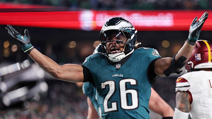 Philadelphia Eagles running back Saquon Barkley celebrates scoring a touchdown.