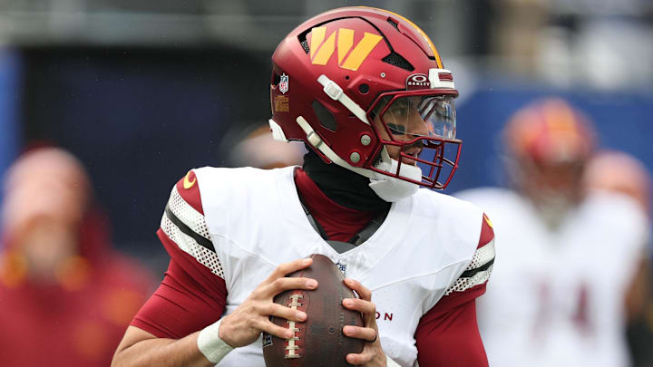 Dec 14, 2025; East Rutherford, New Jersey, USA;  Washington Commanders quarterback Marcus Mariota (8) Mandatory Credit: Vincent Carchietta-Imagn Images
