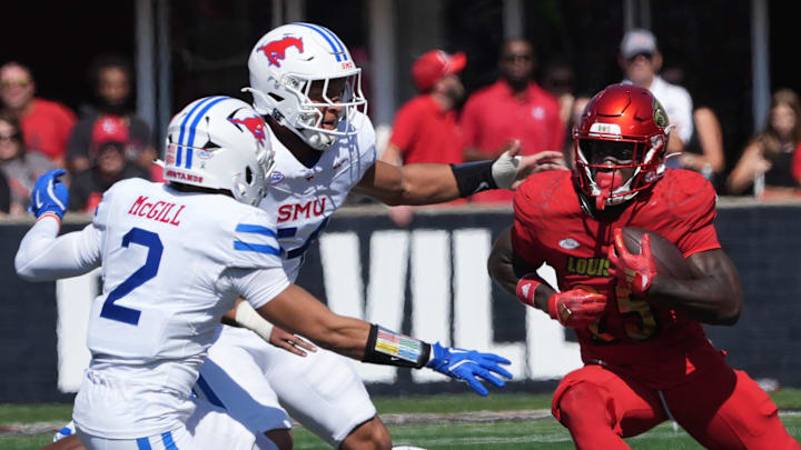Louisville’s Isaac Brown gets a first down against SMU this Saturday.