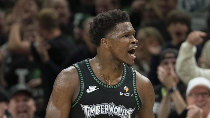 May 8, 2026; Minneapolis, Minnesota, USA; Minnesota Timberwolves guard Anthony Edwards (5) celebrates after making a three point shot as time expires in the first quarter against the San Antonio Spurs during game three of the second round of the 2026 NBA Playoffs at Target Center. Mandatory Credit: Jesse Johnson-Imagn Images