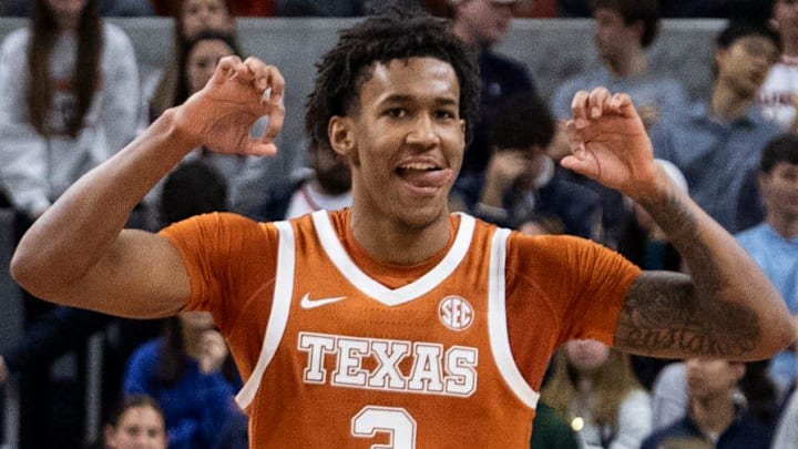 Texas Longhorns guard Dailyn Swain flexes as the Texas Longhorns lead the Auburn Tigers 42-34. Texas Longhorns guard Dailyn Swain flexes as the Texas Longhorns lead the Auburn Tigers 42-34.