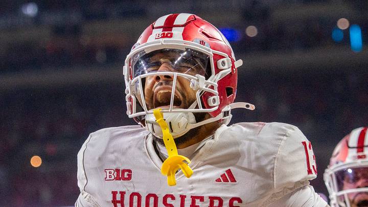 Indiana's Elijah Sarratt (13) celebrates a touchdown catch during the Indiana versus Ohio State Big Ten Championship football game at Lucas Oil Stadium on Saturday, Dec. 6, 2025.