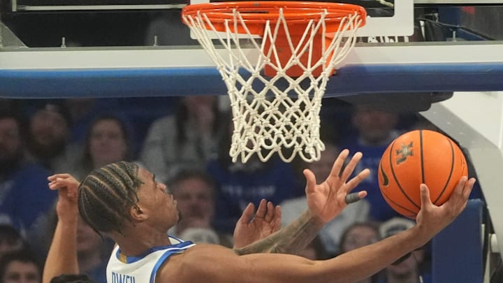 Kentucky's guard Otega Oweh (00) makes the shot against Oklahoma’s Nijel Pack Wednesday night at Rupp Arena.
Feb. 4, 2026