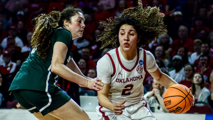 Oklahoma guard Aaliyah Chavez drives against Michigan State in the NCAA Tournament.