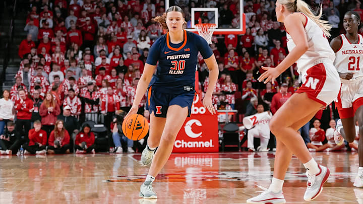 Illinois forward Cearah Parchment (30) drives on a Nebraska defender in the Illini's 81-75 loss to the 24th-ranked Cornhuskers on Saturday in Lincoln, Nebraska.