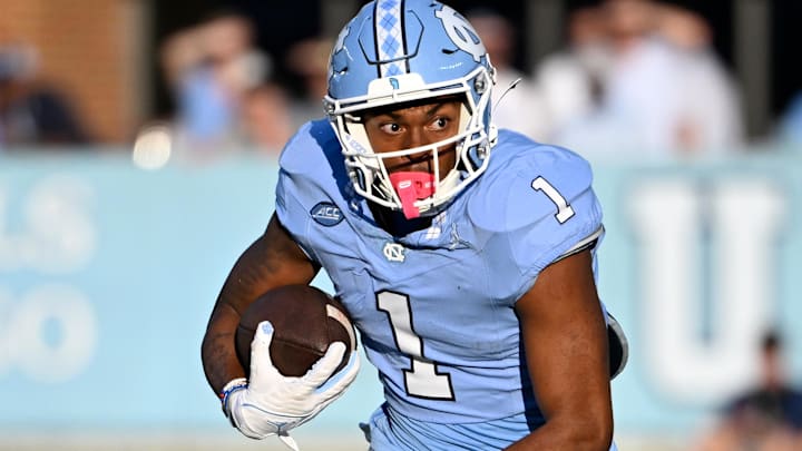 Sep 7, 2024; Chapel Hill, North Carolina, USA; North Carolina Tar Heels wide receiver Jordan Shipp (1)  with the ball in the fourth quarter at Kenan Memorial Stadium. Mandatory Credit: Bob Donnan-Imagn Images