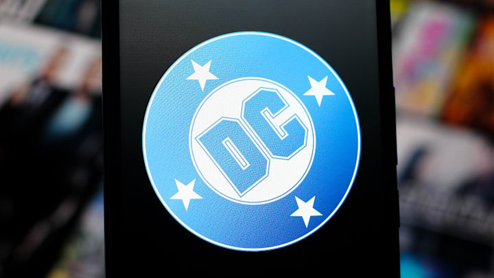 In this photo illustration, the DC Comics logo is seen...