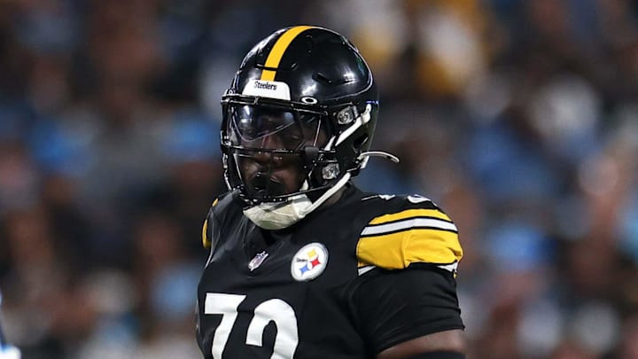 Aug 21, 2025; Charlotte, North Carolina, USA; Pittsburgh Steelers defensive end Esezi Otomewo (72) waits outside of the Carolina Panthers huddle during the third quarter at Bank of America Stadium. Mandatory Credit: Allison Lawhon-Imagn Images