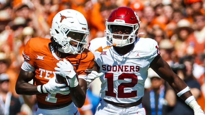 Texas Longhorns wide receiver Xavier Worthy and Oklahoma Sooners defensive back Key Lawrence Texas Longhorns wide receiver Xavier Worthy and Oklahoma Sooners defensive back Key Lawrence