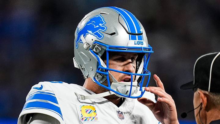 Detroit Lions quarterback Jared Goff (16) talks to a referee regarding a play against Carolina Panthers during the first half at Bank of America Stadium in Charlotte on Sunday, Oct. 4, 2026.