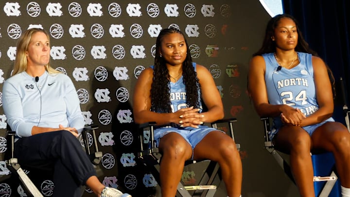 North Carolina head coach Courtney Banghart, junior guard Reniya Kelly and senior guard Indya Nivar 