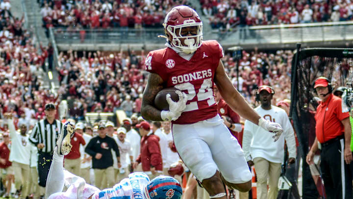 Oklahoma running back Xavier Robinson scores a touchdown against Ole Miss.