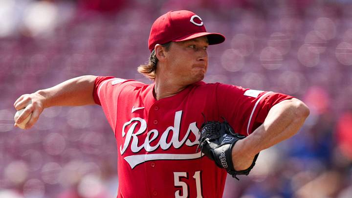 Cincinnati Reds pitcher Brady Singer (51) throws Cincinnati Reds pitcher Brady Singer (51) throws