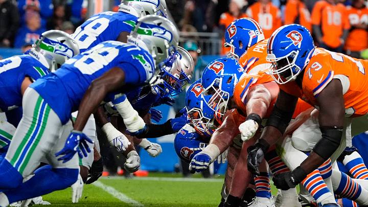 The Seattle Seahawks and Denver Broncos wear throwback uniforms.