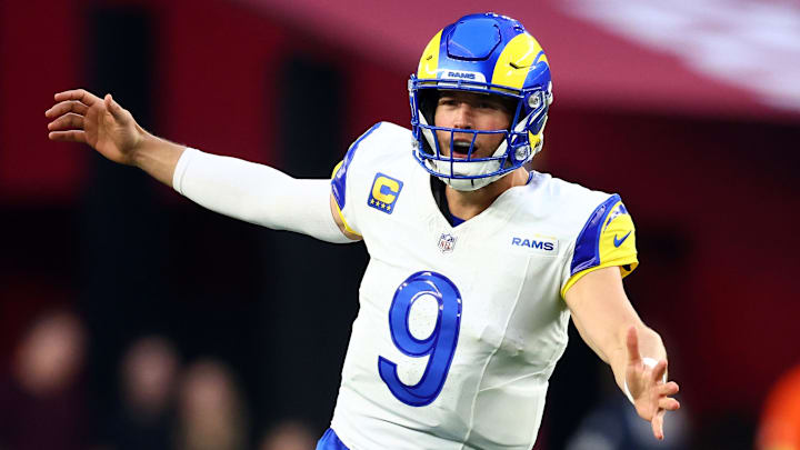 Dec 7, 2025; Glendale, Arizona, USA; Los Angeles Rams quarterback Matthew Stafford (9) reacts against the Arizona Cardinals during the second half at State Farm Stadium. Mandatory Credit: Mark J. Rebilas-Imagn Images