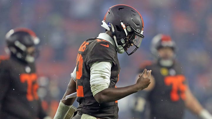 Cleveland Browns quarterback Shedeur Sanders (12) hangs his head as he comes off the field after failing on a two-point conversion attempt during the second half of an NFL football game at Huntington Bank Field, Dec. 7, 2025, in Cleveland, Ohio.