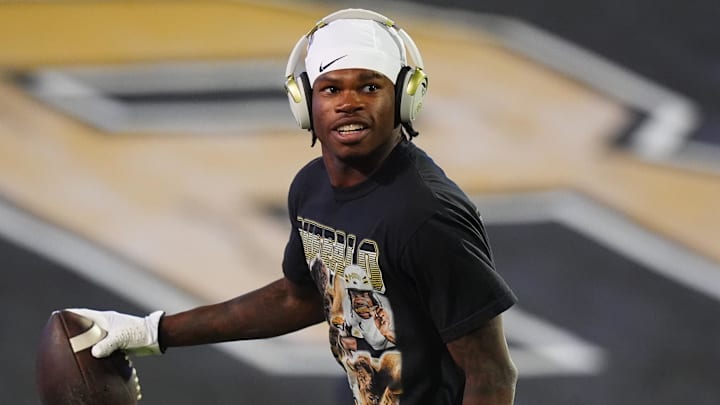 Oct 26, 2024; Boulder, Colorado, USA; Colorado Buffaloes wide receiver Travis Hunter (12) before the game against the Cincinnati Bearcats at Folsom Field. Mandatory Credit: Ron Chenoy-Imagn Images Oct 26, 2024; Boulder, Colorado, USA; Colorado Buffaloes wide receiver Travis Hunter (12) before the game against the Cincinnati Bearcats at Folsom Field. Mandatory Credit: Ron Chenoy-Imagn Images