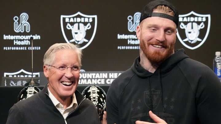 Las Vegas Raiders defensive end Maxx Crosby (right) and coach Pete Carroll at press conference Las Vegas Raiders defensive end Maxx Crosby (right) and coach Pete Carroll at press conference
