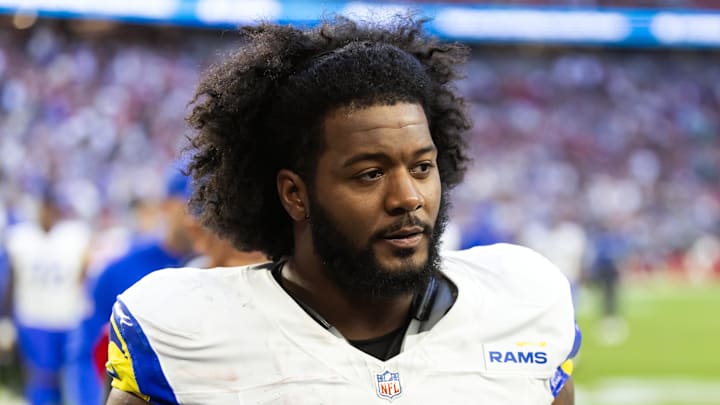 Dec 7, 2025; Glendale, Arizona, USA; Los Angeles Rams defensive end Desjuan Johnson (94) against the Arizona Cardinals at State Farm Stadium. Mandatory Credit: Mark J. Rebilas-Imagn Images Dec 7, 2025; Glendale, Arizona, USA; Los Angeles Rams defensive end Desjuan Johnson (94) against the Arizona Cardinals at State Farm Stadium. Mandatory Credit: Mark J. Rebilas-Imagn Images