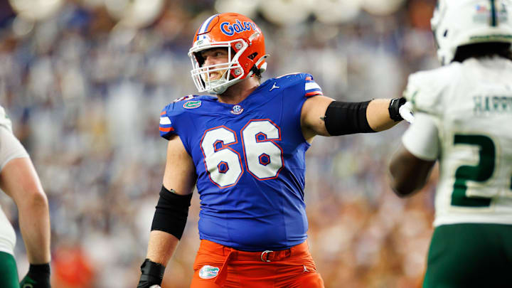 Jake Slaughter prepares to snap the ball.
