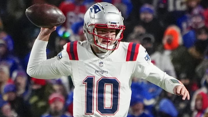 Dec 22, 2024; Orchard Park, New York, USA; New England Patriots quarterback Drake Maye (10) throws the ball against the Buffalo Bills during the second half at Highmark Stadium. Mandatory Credit: Gregory Fisher-Imagn Images