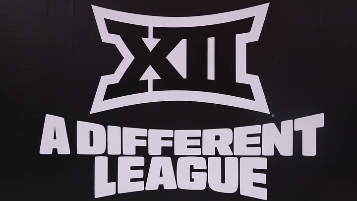 Mar 14, 2026; Kansas City, MO, USA; The Big 12 logo is seen prior to a game between the Arizona Wildcats and the Houston Cougars during the men's Big 12 Conference Tournament Championship at T-Mobile Center.