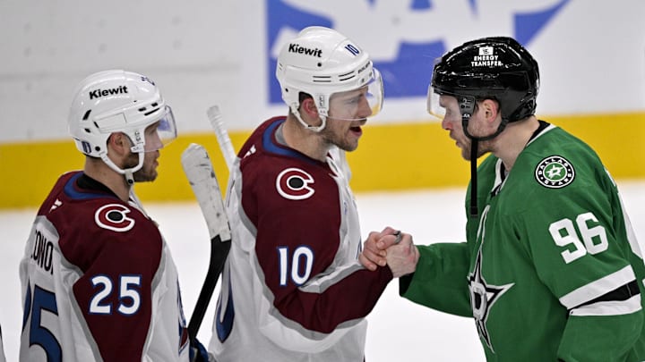 May 3, 2025; Dallas, Texas, USA; Colorado Avalanche center Charlie Coyle (10) shakes hands with Dallas Stars right wing Mikko Rantanen (96) after the Stars defeats the Avalanche in game seven of the first round of the 2025 Stanley Cup Playoffs at American Airlines Center. Mandatory Credit: Jerome Miron-Imagn Images
