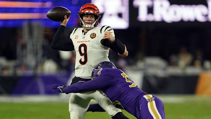 Nov 27, 2025; Baltimore, Maryland, USA; Cincinnati Bengals quarterback Joe Burrow (9) throws pass against Baltimore Ravens linebacker Kyle Van Noy (53) during the second half at M&T Bank Stadium. Mandatory Credit: Mitch Stringer-Imagn Images
