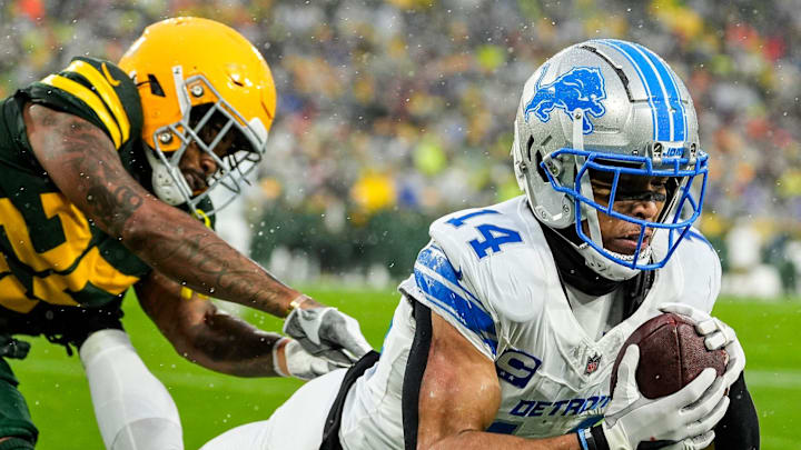 Detroit Lions wide receiver Amon-Ra St. Brown (14) makes a catch for a touchdown against Green Bay Packers 