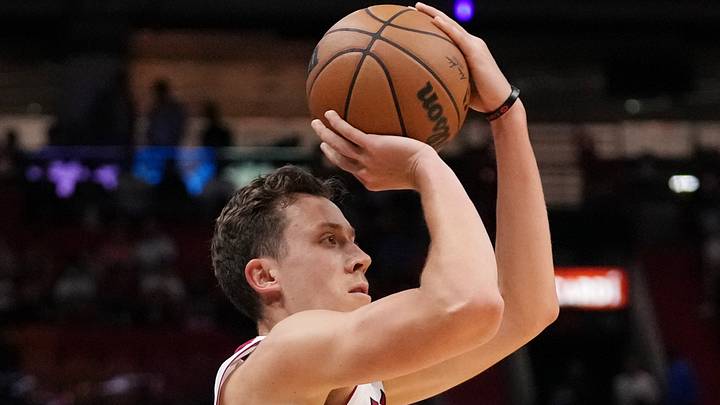 Mar 23, 2022; Miami, Florida, USA; Miami Heat guard Duncan Robinson (55) attempts a three point shot against the Golden State Warriors during the first half at FTX Arena. Mandatory Credit: Jasen Vinlove-USA TODAY Sports