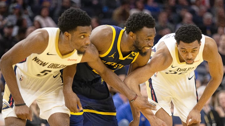 Apr 12, 2024; San Francisco, California, USA; New Orleans Pelicans forwards Herbert Jones (5) and Trey Murphy III (25) await a foul shot with Golden State Warriors forward Andrew Wiggins (22) during the fourth quarter at Chase Center. Mandatory Credit: D. Ross Cameron-Imagn Images Apr 12, 2024; San Francisco, California, USA; New Orleans Pelicans forwards Herbert Jones (5) and Trey Murphy III (25) await a foul shot with Golden State Warriors forward Andrew Wiggins (22) during the fourth quarter at Chase Center. Mandatory Credit: D. Ross Cameron-Imagn Images