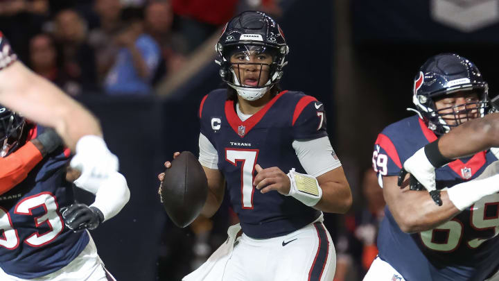 Jan 13, 2024; Houston, Texas, USA; Houston Texans quarterback C.J. Stroud (7) in a 2024 AFC wild card game against the Cleveland Browns at NRG Stadium. Mandatory Credit: Troy Taormina-USA TODAY Sports