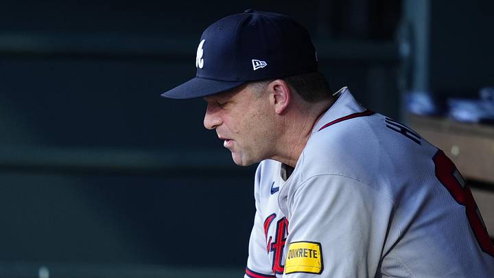 May 2, 2026; Denver, Colorado, USA; Atlanta Braves hitting coach Tim Hyers (80) on the bench during the first inning Colorado Rockies at Coors Field. Mandatory Credit: Ron Chenoy-Imagn Images