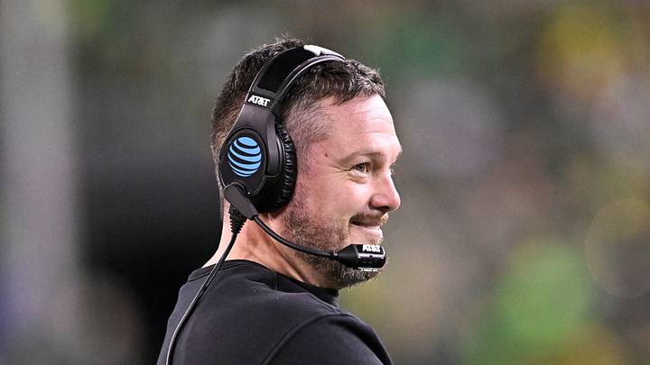 Dec 20, 2025; Eugene, OR, USA; Oregon Ducks head coach Dan Lanning smiles during the third quarter against the James Madison Dukes at Autzen Stadium. Mandatory Credit: Craig Strobeck-Imagn Images Dec 20, 2025; Eugene, OR, USA; Oregon Ducks head coach Dan Lanning smiles during the third quarter against the James Madison Dukes at Autzen Stadium. Mandatory Credit: Craig Strobeck-Imagn Images