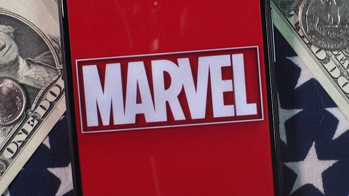 In this photo illustration, Marvel Entertainment logo seen...