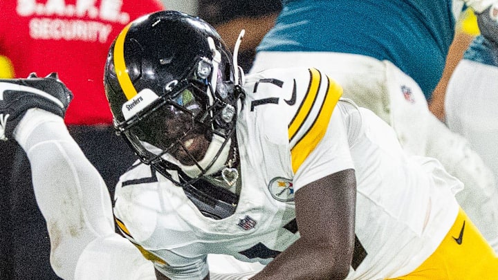 Jacksonville Jaguars wide receiver Dorian Singer (13) is tackled by Pittsburgh Steelers cornerback D'Shawn Jamison (17) during the second half of the first preseason game where the Jacksonville Jaguars hosted the Pittsburgh Steelers Saturday Aug. 9, 2025, at EverBank Stadium in Jacksonville, Fla. [Doug Engle/Florida Times-Union]