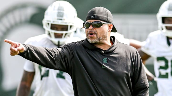 Michigan State's cornerbacks coach Demetrice Martin works with players during the first day of football camp on Tuesday, July 30, 2024, in East Lansing.