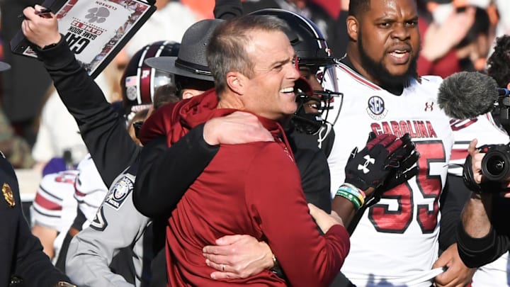 Nov 30, 2024; Clemson, South Carolina, USA; Clemson head coach Dabo Swinney and South Carolina Head Coach Shane Beamer talk after the game at Memorial Stadium. Mandatory Credit: Ken Ruinard-Imagn Images Nov 30, 2024; Clemson, South Carolina, USA; Clemson head coach Dabo Swinney and South Carolina Head Coach Shane Beamer talk after the game at Memorial Stadium. Mandatory Credit: Ken Ruinard-Imagn Images