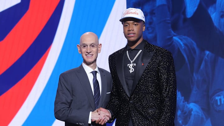 Jun 25, 2025; Brooklyn, NY, USA;  Thomas Sorber stands with NBA commissioner Adam Silver after being selected as the 15th pick by the Oklahoma City Thunder in the first round of the 2025 NBA Draft at Barclays Center. Mandatory Credit: Brad Penner-Imagn Images