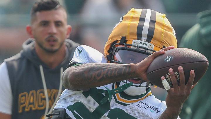 Green Bay Packers wide receiver Matthew Golden (22) catches a pass during training camp last year.