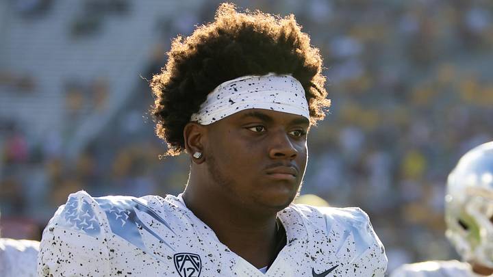 Nov 18, 2023; Tempe, Arizona, USA; Oregon Ducks defensive lineman A'Mauri Washington (58) against the Arizona State Sun Devils at Mountain America Stadium. Mandatory Credit: Mark J. Rebilas-Imagn Images Nov 18, 2023; Tempe, Arizona, USA; Oregon Ducks defensive lineman A'Mauri Washington (58) against the Arizona State Sun Devils at Mountain America Stadium. Mandatory Credit: Mark J. Rebilas-Imagn Images