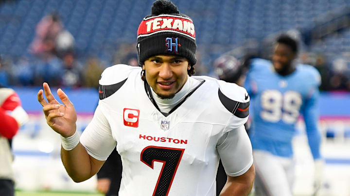 Jan 5, 2025; Nashville, Tennessee, USA;  Houston Texans quarterback C.J. Stroud (7) waves to the crowd against the Tennessee Titans during the second half at Nissan Stadium. Mandatory Credit: Steve Roberts-Imagn Images