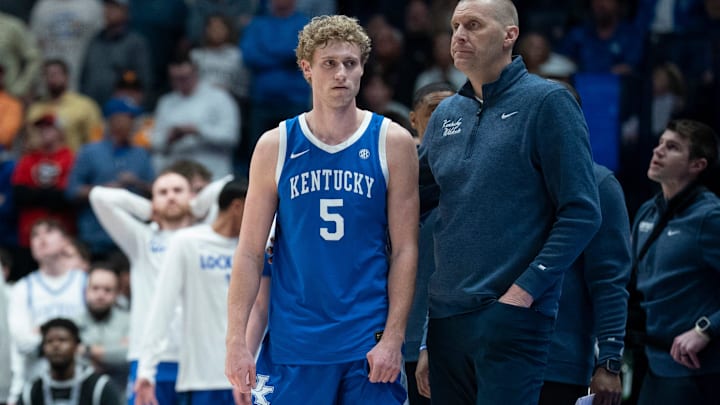 Kentucky guard Collin Chandler (5) talks with Kentucky coach Mark Pope after fouling out against Florida during their quarterfinal game of the 2026 SEC Men’s Basketball Tournament at Bridgestone Arena in Nashville, Tenn., Friday, March 13, 2026.