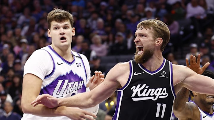 Oct 24, 2025; Sacramento, California, USA; Sacramento Kings center Domantas Sabonis (11) controls the ball against Utah Jazz center Walker Kessler (24) during the fourth quarter at Golden 1 Center.