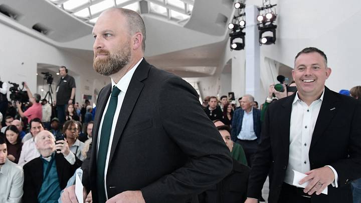 May 6, 2026; Milwaukee, WI, USA;  Milwaukee Bucks introduce new head coach Taylor Jenkins with general manager Jon Horst (right) at a press conference at the Milwaukee Art Museum. Mandatory Credit: Benny Sieu-Imagn Images