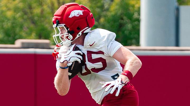 Arkansas Razorbacks tight end Ty Lockwood pulls down a catch during practice. Arkansas Razorbacks tight end Ty Lockwood pulls down a catch during practice.